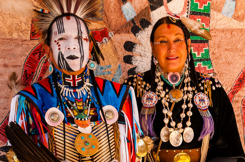Zuni Indian man and Northern Cheyenne woman wearing regalia, Indian Pueblo Culture Center, Albuquerque, New Mexico USA.